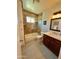 Elegant bathroom featuring a shower over tub, tile details, and modern fixtures at 3807 E Altadena Ave, Phoenix, AZ 85028