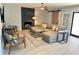 Spacious living room with modern fireplace and comfortable sectional seating at 3807 E Altadena Ave, Phoenix, AZ 85028