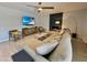 Inviting living area with modern decor, a fireplace, and entertainment setup at 3807 E Altadena Ave, Phoenix, AZ 85028