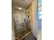 Tile shower with a glass door, and a shelf at 3807 E Altadena Ave, Phoenix, AZ 85028