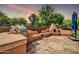 Backyard featuring a custom outdoor kitchen with built-in grill, counter space, and a pizza oven at 40202 N Oakhurst Ct, Anthem, AZ 85086