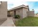 Charming single-story home with well-maintained landscaping and a quaint walkway leading to the entrance at 406 E Washington Ave # C, Gilbert, AZ 85234