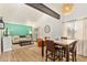 Open-concept living and dining area with modern furnishings and lots of natural light at 406 E Washington Ave # C, Gilbert, AZ 85234