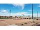 Outdoor basketball court with sports lighting offering recreational opportunities for residents at 4276 E Brook Lynn Pl, San Tan Valley, AZ 85140