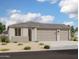 Charming single-story home featuring a low maintenance yard, and a two car garage at 4276 E Brook Lynn Pl, San Tan Valley, AZ 85140