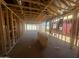 Spacious interior with exposed wood framing, highlighting the potential for a modern design at 4276 E Brook Lynn Pl, San Tan Valley, AZ 85140