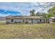 Charming single-story home boasts a neutral palette and well-manicured front lawn at 4311 W Siesta Way, Laveen, AZ 85339