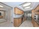 Spacious kitchen featuring stainless steel appliances, sleek countertops, and wood cabinetry at 4311 W Siesta Way, Laveen, AZ 85339