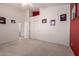 Spacious carpeted bedroom with a ceiling fan and decoratively framed pictures on the walls at 4531 W Flint St, Chandler, AZ 85226
