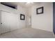 Cozy bedroom features a ceiling fan, closet and an open doorway leading to another room at 4531 W Flint St, Chandler, AZ 85226