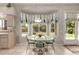 Cozy dining area with a bay window, offering views and natural light at 4531 W Flint St, Chandler, AZ 85226