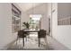 Modern dining room showcasing stylish table, chairs, and plenty of natural light at 4531 W Flint St, Chandler, AZ 85226