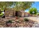 Landscaped front yard with desert plants and a mature tree providing shade and curb appeal at 4531 W Flint St, Chandler, AZ 85226
