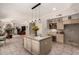 Bright eat-in kitchen with a center island, seamlessly connected to the living area at 4531 W Flint St, Chandler, AZ 85226