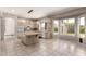 Bright and airy kitchen with island, breakfast area, and natural light at 4531 W Flint St, Chandler, AZ 85226