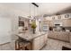 Charming kitchen with a center island, tiled countertops, and ample cabinet space at 4531 W Flint St, Chandler, AZ 85226