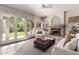 Inviting living room boasts natural light, a cozy fireplace, and seamless access to a lush outdoor space at 4531 W Flint St, Chandler, AZ 85226