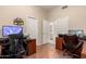 Spacious office features a desk, two chairs, and bright light at 4531 W Flint St, Chandler, AZ 85226