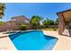 Backyard pool featuring crystal-clear water, a beige pool deck, and desert landscaping at 4531 W Flint St, Chandler, AZ 85226