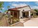 Beautiful backyard featuring an outdoor sauna, covered patio, and lush greenery at 4558 E Vista Dr, Phoenix, AZ 85032