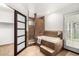 Well-lit bathroom with large tub and shower, earth tone tile, and lots of light at 4558 E Vista Dr, Phoenix, AZ 85032
