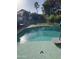Inviting pool featuring a sun-drenched deck and a decorative dolphin design at 4558 E Vista Dr, Phoenix, AZ 85032