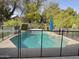 Beautiful pool with a safety fence, perfect for relaxing and entertaining in a private backyard at 4558 E Vista Dr, Phoenix, AZ 85032
