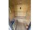Relaxing sauna interior with wooden benches and traditional sauna stones for a rejuvenating experience at 4558 E Vista Dr, Phoenix, AZ 85032