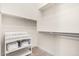 Walk-in closet with storage shelves, providing ample space for keeping things organized and easily accessible at 4884 S Hemet St, Gilbert, AZ 85298