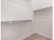 Interior view of a well-organized closet with plenty of hanging space and storage at 4884 S Hemet St, Gilbert, AZ 85298