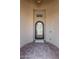 Close-up of an elegant front door with decorative wrought iron and a welcoming wreath at 4884 S Hemet St, Gilbert, AZ 85298