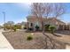 Charming house showcasing a turret detail, complemented by desert landscaping, and inviting curb appeal at 4884 S Hemet St, Gilbert, AZ 85298