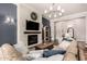 Cozy living room features a fireplace and a comfortable seating area at 4884 S Hemet St, Gilbert, AZ 85298