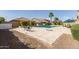 Inviting backyard featuring a pool and lots of space for entertaining or relaxing in the sun at 4884 S Hemet St, Gilbert, AZ 85298
