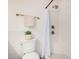 Updated bathroom with tiled shower, mosaic flooring, and modern fixtures at 5142 E Holly St, Phoenix, AZ 85008