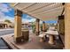 Exterior view of a community picnic area with a ramada covering at 5142 E Holly St, Phoenix, AZ 85008