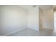 Neutral bedroom with tile floors and doorway leading to other rooms at 6418 N 17Th St, Phoenix, AZ 85016