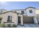 Beautiful two-story home with stone accents, dark trim, and a two-car garage at 6418 N 17Th St, Phoenix, AZ 85016