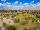 Panoramic aerial view featuring a blue-covered playground and a green park surrounded by a residential community at 6438 E Montreal Pl, Scottsdale, AZ 85254