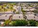 Beautiful neighborhood aerial view highlighting landscaped streets, nearby park, and well-maintained homes with tiled roofs at 6438 E Montreal Pl, Scottsdale, AZ 85254