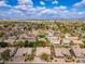 Picturesque aerial shot of neighborhood showcasing lush greenery, charming homes, and easy access to nearby amenities at 6438 E Montreal Pl, Scottsdale, AZ 85254