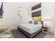 Serene bedroom with a desk, modern lighting, and a comfortable bed at 6438 E Montreal Pl, Scottsdale, AZ 85254