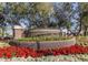 Kierland community entrance sign surrounded by colorful flowers and mature landscaping at 6438 E Montreal Pl, Scottsdale, AZ 85254