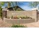 Landscaped community sign reads 'Kierland' with colorful flowers and manicured plants at 6438 E Montreal Pl, Scottsdale, AZ 85254