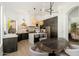 Spacious kitchen with a center island, pendant lighting, stainless appliances, and plenty of counter space at 6438 E Montreal Pl, Scottsdale, AZ 85254