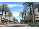Charming street view lined with palm trees and retail spaces in a vibrant shopping area at 6438 E Montreal Pl, Scottsdale, AZ 85254