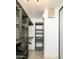 Well-organized walk-in closet with ample shelving and hanging space, maximizing storage and functionality at 6438 E Montreal Pl, Scottsdale, AZ 85254