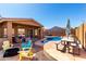 Outdoor living at its finest with pool, covered patio, picnic table and seating in the backyard at 7150 W Avenida Del Rey --, Peoria, AZ 85383