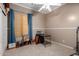 Bedroom with a ceiling fan, neutral colored walls, and natural light from the window at 7150 W Avenida Del Rey --, Peoria, AZ 85383