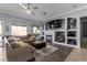 Comfortable living room featuring a cozy fireplace and modern decor at 7150 W Avenida Del Rey --, Peoria, AZ 85383